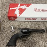 $190 Rough Rider w engraved 22 wmr and ammo 2
