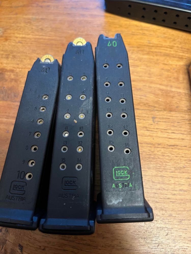 Glock 40 cal mags 2 15rnd 1 10rnd