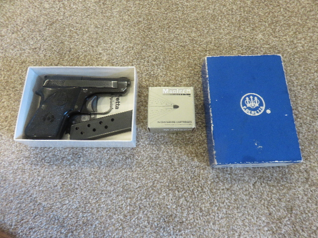 PISTOL IN BOX WITH BOX OF AMMO PISTOL IN BOX WITH BOX OF AMMO