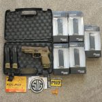 OVERHEAD VIEW SHOWING SIG MODEL 17 AND ALL MAGAZINES AND ALL PAPERWORK